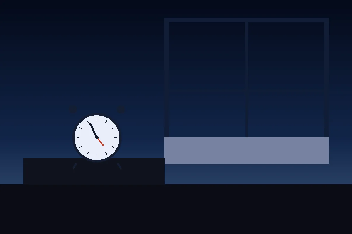 An alarm clock by a bedside window as the sky begins to lighten before dawn