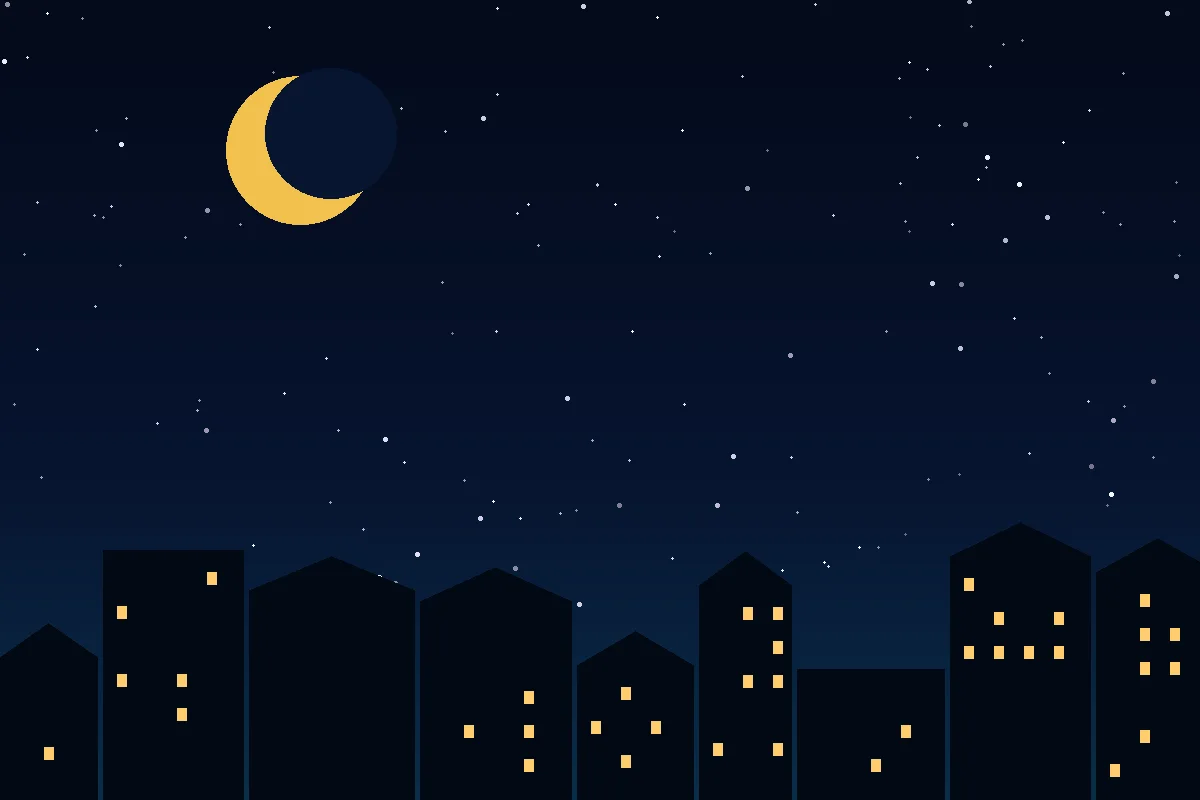 A crescent moon over quiet city rooftops late at night